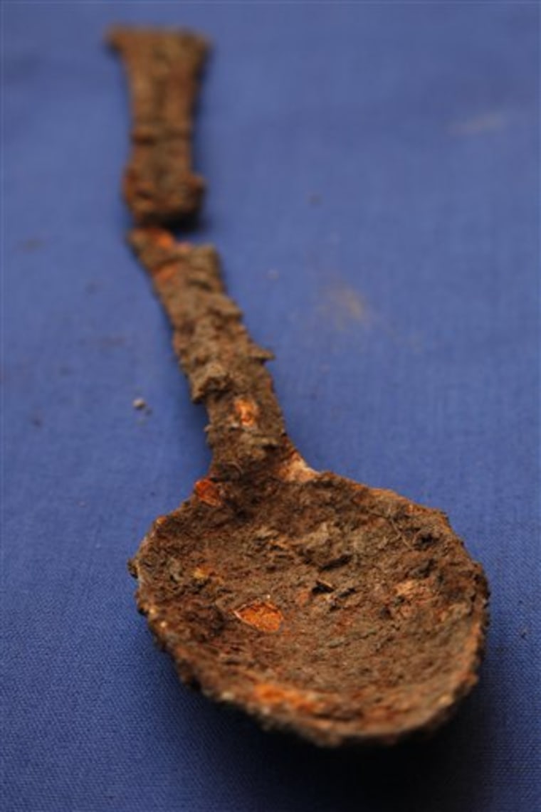 Shown is a cooking spoon unearthed near a mass grave, in Malvern, Pa., at the Duffy's Cut Museum at Immaculata University, Tuesday, Feb. 28, 2012, in Immaculata, Pa. Researchers believe the mass grave contains the remains of about 50 Irish immigrants who died weeks after coming to Pennsylvania to build a railroad in 1832. (AP Photo/Matt Rourke)